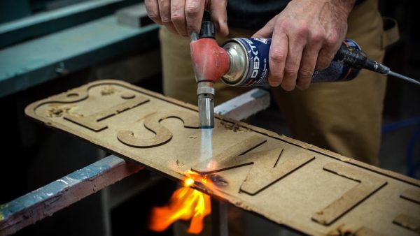 soplete fuego placa